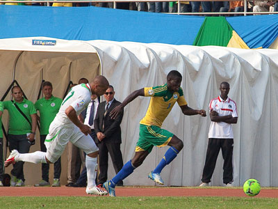Defender Abouba Sibomana seen here dribbling past Algeriau2019s Feghouli Sofiane in a past world cup qualifier will be vital for Eric Nshimiyimanau2019s team which is seeking to overturn a....