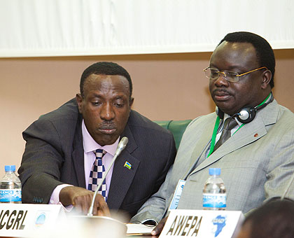 DRCu2019s Senator Kisanga (R) and Rwanda Senate president,  Dr Jean Damascu00e8ne Ntawukuriryayo share notes during the opening of the meeting. The New Time/Timothy Kisambira