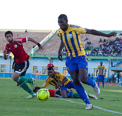 Striker Jessy Reindorf  (R) in action for Amavubi during a friendly match against Libya in March. The New Times/T. Kisambira.