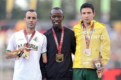 Hermas Cliff Muvunyi [C] on the winners' podium after the 800m gold medal victory. The New Times/Courtesy.