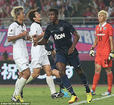 Wilfried Zaha celebrates his last-minute equaliser for Manchester United. Net photo.