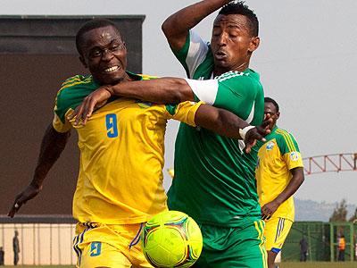 Amavubi Starsu2019 striker Michel Ndahinduka battles Abebaw Butako in the second half during Saturdayu2019s CHAN second leg qualifier at Stade de Kigali, yesterday. Sunday Sport/T. Kisambira