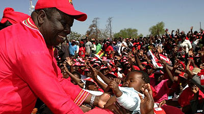 Morgan Tsvangirai during one of his campaign meetings. Tsvangiraiu2019s private life and marriage to Elizabeth Macheka (inset) has become an election issue. Net photos.