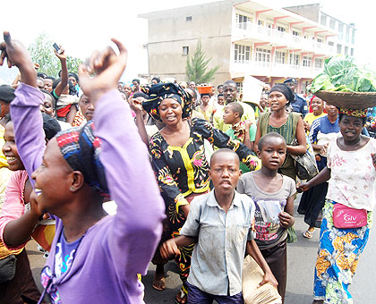 Former hawkers celebrate getting stalls in Biryogo Market. The New Times/ Seraphine Habimana.