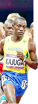 Robert Kajuga  (left) seen here during 10000m Men's Olympic final last year.  Times Sports / File