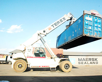 A crane moves a goods container at Magerwa container terminal. Efficient recovery of tax arrears and internally designed tax administration and collection measures have ensured improve....