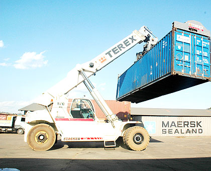 A crane moves a goods container at Magerwa container terminal. Efficient recovery of tax arrears and internally designed tax administration and collection measures have ensured improve....