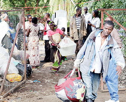 Congolese refugees prepare to board a lorry at Goma to Nyakamira transit camp. The New Times/ File.