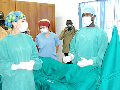 Medics inspect the new facility at CHUK during the official launch yesterday.  Courtesy photo.