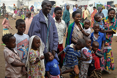 Singirankabo with his wide family immediately after returning home. BELOW. Newly repatriated refugees talk to their colleagues at  Nkamira Transit Centre  The New Times/Jean du2019Amour ....
