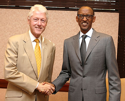 Presidents Kagame and Clinton in Kigali yesterday. The New Times/Village Urugwiro.
