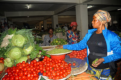 Grocery stalls in a market. Prices of common foodstuff such as tomatoes and Irish potatoes have shot up in Rubavu and Musanze markets.  The New Times/ File. 