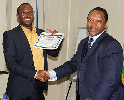 Prof. Shyaka (R) and Green Partyu2019s Ntezimana yesterday. Saturday Times/ John Mbanda. 