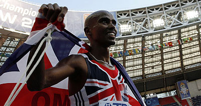 Mo Farah jogs through 5,000 metres semi-final. Net photo.