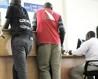 People registering businesses at RDB. Companies have been warned against registering and modifying operations. The New Times/File.