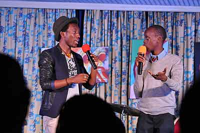 Local comedians Arthur (L) and Babou spiced up Koudouu2019s album launch. All photos by Plaisir Muzogeye.