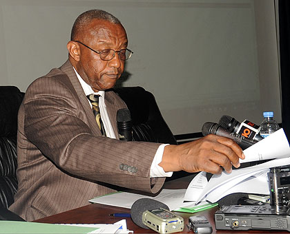 Prof. Mbanda unveils the full list of parliamentary aspirants in Kigali yesterday.  The New Times/John Mbanda.  