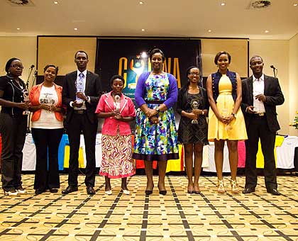 Mrs Kagame together with the seven CYRWA winners at the awards ceremony on Tuesday. The New Times/Timothy Kisambira