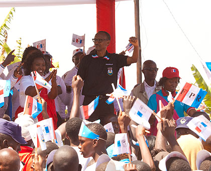 Paul Kagame, the RPF party chairman, is joined by party supporters at the rally in Kamonyi yesterday. The New Times/Timothy Kisambira. 
