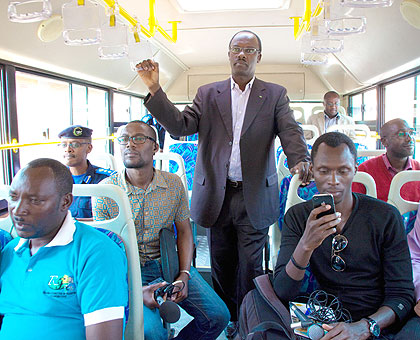 City of Kigali mayor Fidele Ndayisaba and other passengers during the launch of the KBS designated route covering Kabuga, Mulindi, Remera and Kanombe yesterday. Saturday Times/Timo....