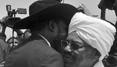 Sudanese President Omar al-Bashir (right) greets his South Sudanese counterpart Salva Kiir.Net photo.