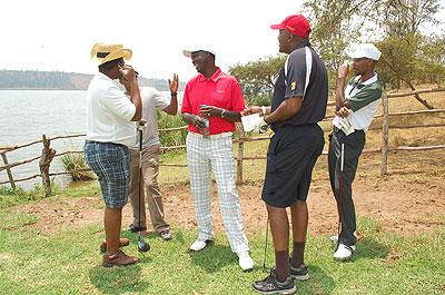  Members of the local golf fraternity share a light moment.
