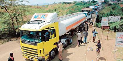 Cargo transporters wait to clear at customs post. When the single custom territory is implemented, such long lines will cease. The New Times / File photo