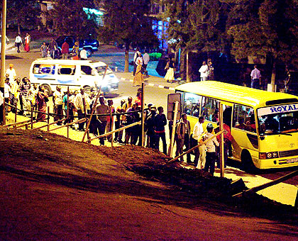 City commuters queue for buses during peak hours yesterday. The New Times/T. Kisambira