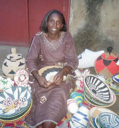 Mujawayezu and some of her crafts. The New Times/ I. Ngoboka