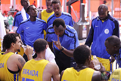 Head coach Moise Mutokambali giving tips to his players at the just concluded Fifa Afrobasket championships in Ivory Coast.