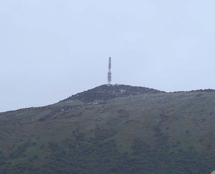 The 40-metre broadcasting antenna on top of Mt  Karisimbi as seen from Ruhengeri. It is used by Kalisimbi radio FM. Net Photo