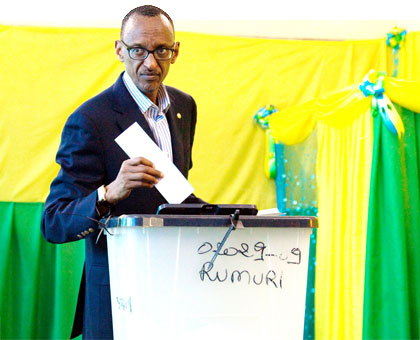 President Kagame casts his ballot at APE Rugunga polling centre in Kiyovu, Kigali, yesterday.  The New Times/T. Kisambira.