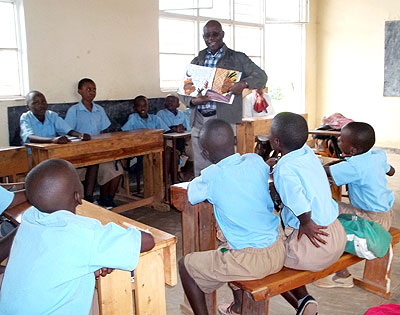 A teacher engages his pupils in a classroom. If students evaluate their teachers, many shortcomings and be fixed. The New Times/ Courtesy.