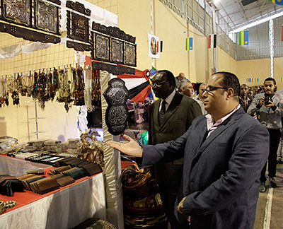Minister Kanimba tours a stall at the Egypt Expo in Kigali on Wednesday.   Saturday Times/Timothy Kisambira.