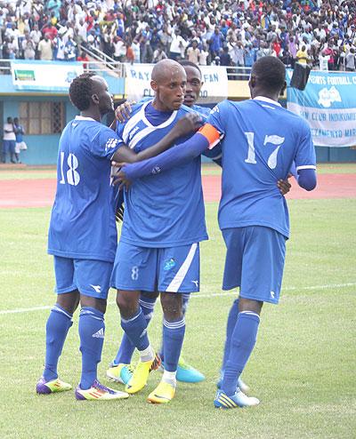 Djamal Mwiseneza (C) celebrates with team mates after putting Rayon Sports ahead yesterday. Sunday Sport/ P. Muzegeye.
