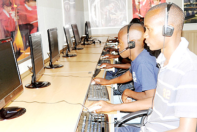 Youth use Internet at an ICT hub in Kigali. The Internet is the number one source of academic information today. The New Times/ File.