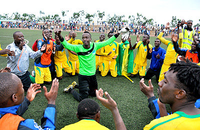 AS Kigali players celebrate after beating Rayon Sports to win the inaugural Super Cup. Saturday Sport / T. Kisambira.