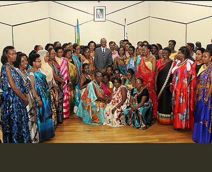 Some of the new legislators pose for a group photo with President Kagame at the Parliamentary Building in Kimuhurura yesterday.  Saturday Times/ Village Urugwiro. 