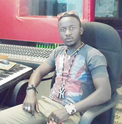 Umuhoza in his music studio. The New Times/ Collins Mwai.
