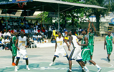 Espoir (in green) playing against Kenya's USIU during this year's Zone V championships in Bujumbura. Times Sport/ File