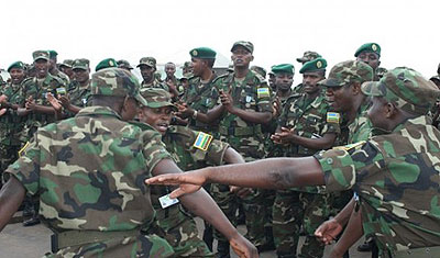 RDF soldiers dance during a past event. The liberation struggle is credited for Rwandau2019s rebirth. The New Times /File. 