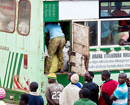 Travellers watch as their luggage are loaded on to an Onatracom bus. The Ministry of Infrastructure is set to scrutinise proposals of Seven Solutions Ltd, KPMG International and SM....