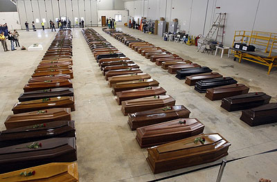 The coffins of hundreds of African dead bodies recovered in Lampedusa, Italy. Net photo.