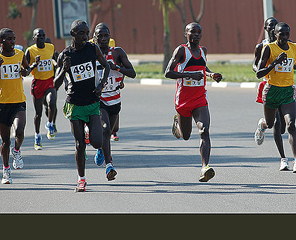 Alex Nizeyimana (496) breaks  away from other runners to win the  menu2019s MTN Kigali half marathon after clocking 1:02:21 yesterday. The New Times/John Mbanda