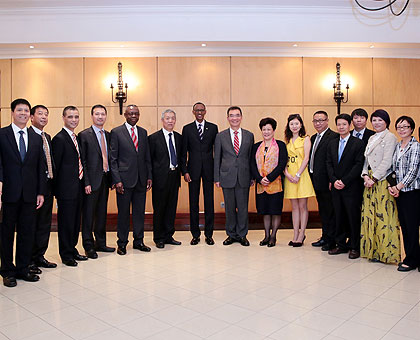 The visiting Chinese investors and experts pose for a group photo with President Kagame at Village Urugwiro after their meeting yesterday. The New Times/Village Urugwiro