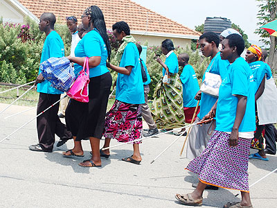 Dozens of visually impaired persons took part in a march to raise awareness on the White Cane Day. The New Times/JP Bucyensenge