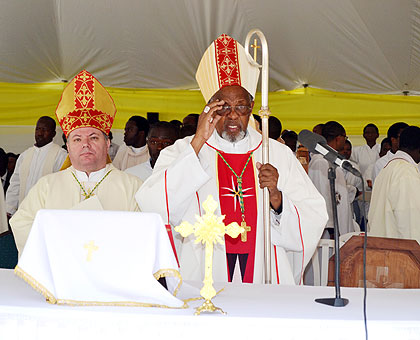 Archbishop Russo (L) represented Pope Francis at the jubilee celebrations of Rambura Parish. The New Times/ Jean Mbonyinshuti.