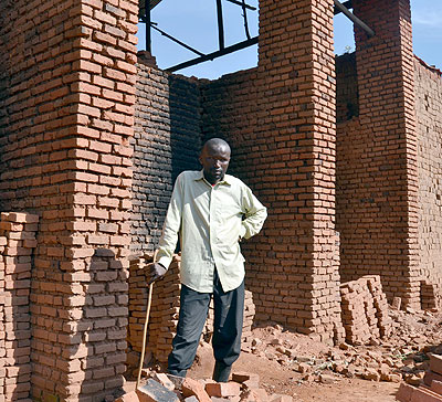 Semirindi stands in front of his Kiln in Musanze District.  The New Times/Jean du2019Amour Mbonyinshuti. 