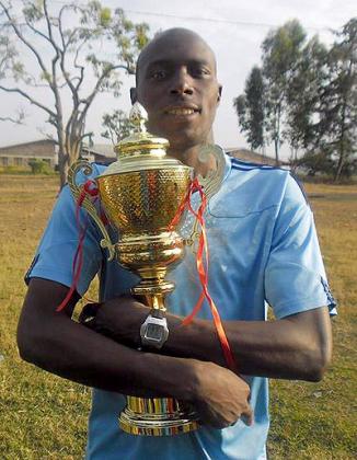 Francois Xavier Ngarambe holding the 2012 Liberation Day tournament trophy. Saturday Sport/ Courtesy.