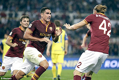 Marco Borriello celebrates scoring the only goal of the game to maintain Roma's 100 per cent start. Net photo
